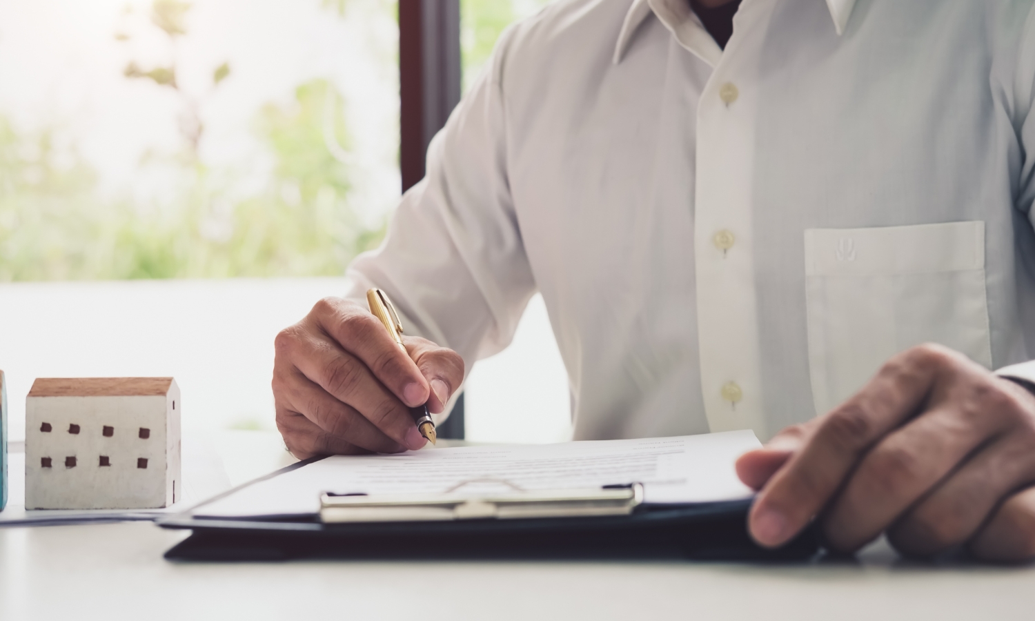 Man writing in notebook