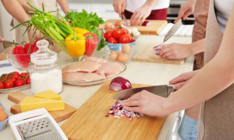 People cooking together in a class